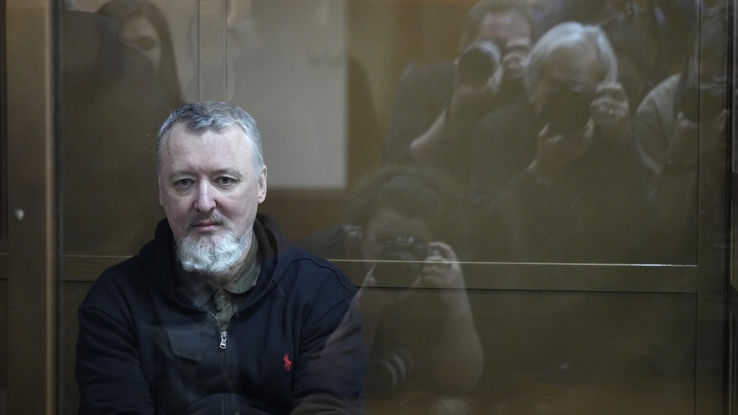 Russian courts jail a Putin critic and a woman convicted of a blast that killed a pro-war blogger