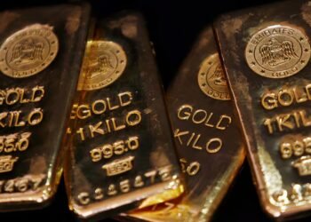 Gold ticks up as softer Fed rate expectations offset higher yields 