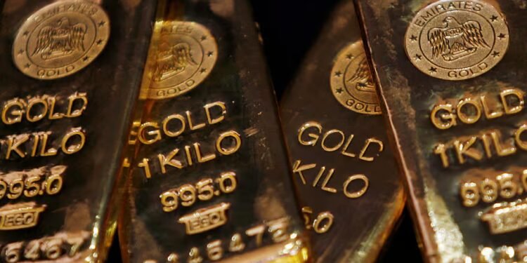 Gold ticks up as softer Fed rate expectations offset higher yields 