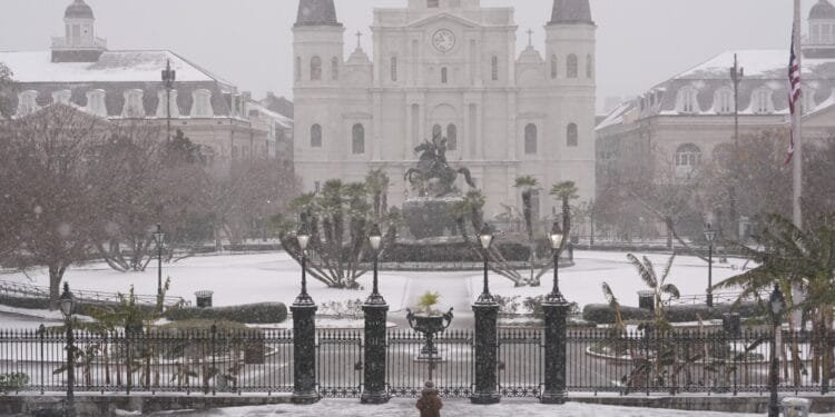 A frigid storm drops rare snow on Houston and New Orleans as Florida readies plows in the Panhandle