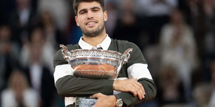 Alcaraz downs Sinner in five-set thriller to win French Open title