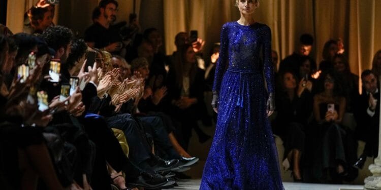 Armani's last collection shown in solemn runway show with Richard Gere, Lauren Hutton in 1st row