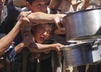 At least 60 people killed by Israeli strikes in Gaza as Israel lets minimal aid in