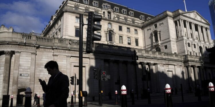Bank of England halves UK growth projection and cuts main interest rate to 4.50%