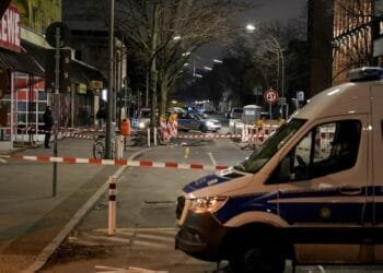 Berlin police say they have detained a man who attacked 2 people with a knife