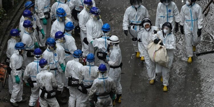 Death toll in Hong Kong apartment complex fire hits 146