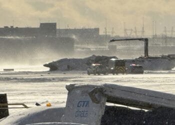 Delta Airlines plane flips on landing in Toronto and a badly hurt child is among 19 injured