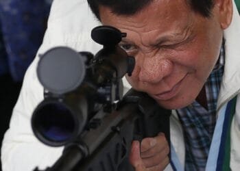 Duterte refused fingerprinting and threatened lawsuits during chaotic arrest, Philippine police say