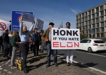 Elon Musk protesters gather at Tesla showrooms