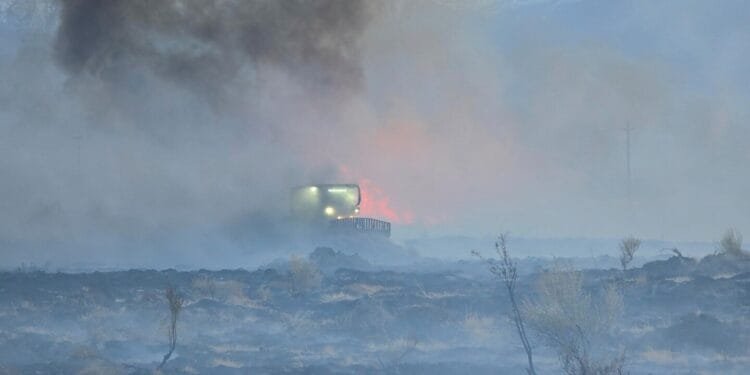 Evacuations ordered as winds pose challenges for firefighters battling California blaze