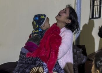 Families in India cremate loved ones killed in stampede at religious festival