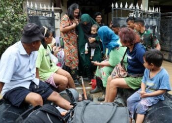 Floods in Indonesia's capital displace thousands