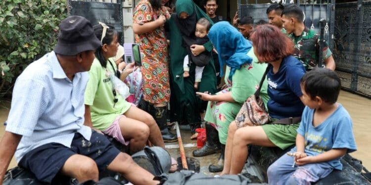 Floods in Indonesia's capital displace thousands