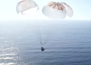 Four space tourists return to Earth after a private flight over the poles