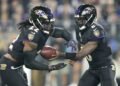 Henry runs for 199 yards and Jackson has 3 TDs as Ravens rout previously unbeaten Bills 35-10