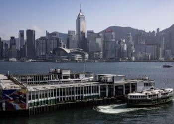 Hong Kong cancels passports, bans financial support for wanted activists