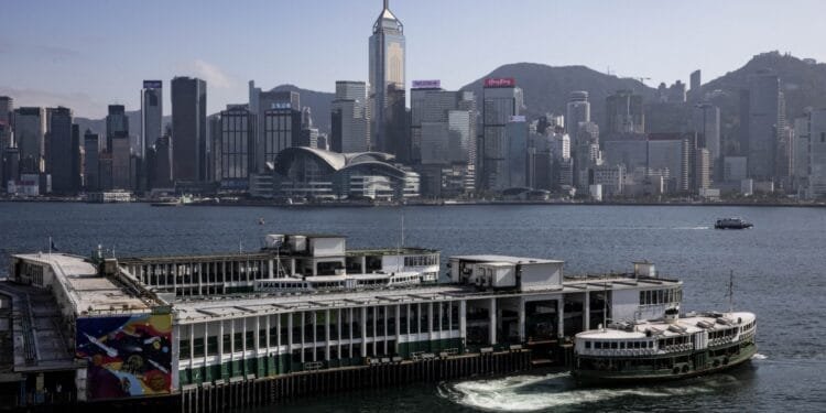 Hong Kong cancels passports, bans financial support for wanted activists