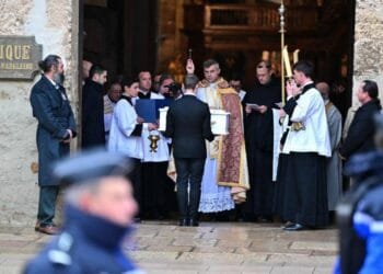 Hundreds of mourners bid farewell to French toddler