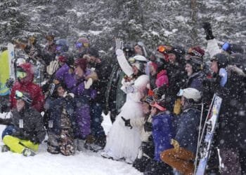 'I do:' Dozens of couples get hitched at snowy Colorado ski resort on Valentine's Day