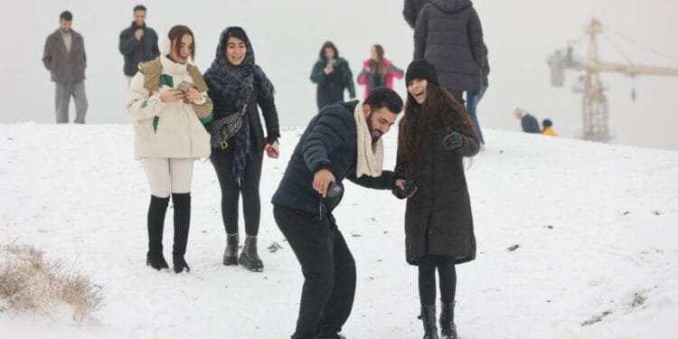 Iranian schools and offices shut as cold snap bites