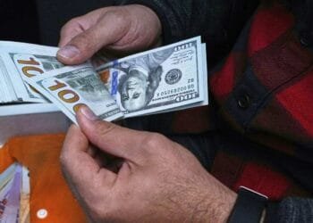 Iran’s currency falls to record low against the dollar as tensions run high