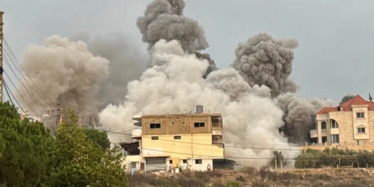 Israel launches new wave of air attacks on Lebanon, straining fragile truce