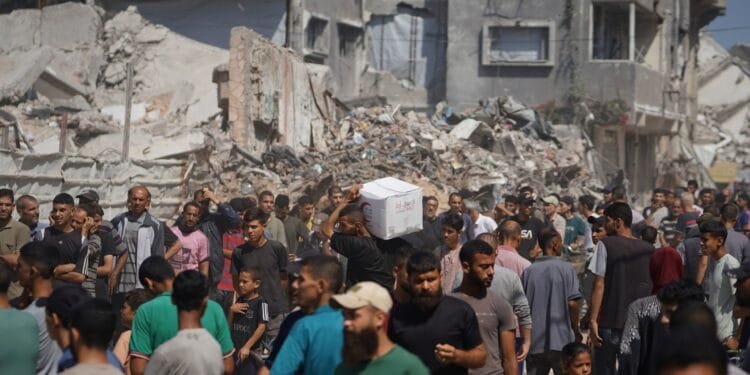 Israeli attacks kill 62 Palestinians in Gaza, including three near aid site