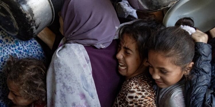 Israeli strikes kill 51 in Gaza as aid groups collect limited supplies