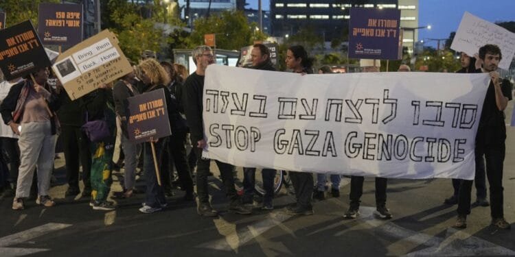 Israeli troops deploy to a new security corridor across southern Gaza