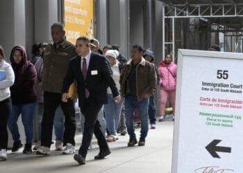 Justice Department fires 20 immigration judges from backlogged courts amid major government cuts