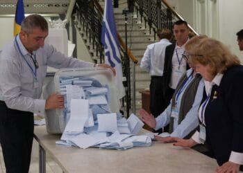 Moldova’s pro-EU party takes lead in election as vote counting under way