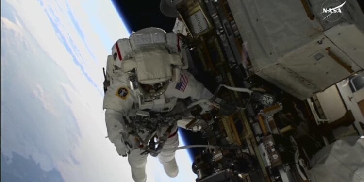 NASA’s 2 stuck astronauts take their first spacewalk together 1 NASA’s 2 stuck astronauts take their first spacewalk together