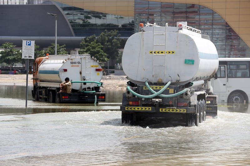 Tankers clearing waterlogged roads near Discovery Gardens metro station in Dubai on April 22. Pawan Singh / media