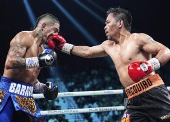 Pacquiao held to draw by Barrios in world title return