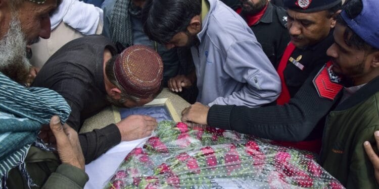 Pakistan’s leader meets survivors of deadly train hijacking and the commandos who ended the siege