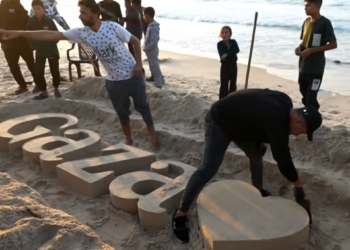 Palestinian sculptors create art on Gaza beach sand to escape Israel’s war