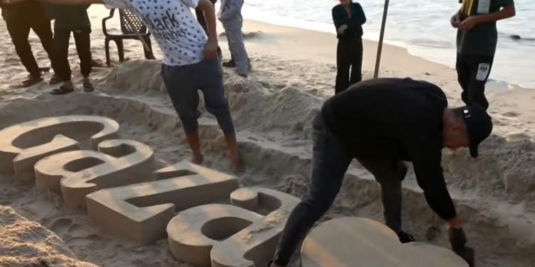 Palestinian sculptors create art on Gaza beach sand to escape Israel’s war
