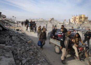 Palestinians trek across rubble to return to their homes as Gaza ceasefire takes hold