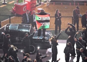 Performer in rapper Kendrick Lamar's Super Bowl halftime show unfurls Sudan-Palestine flag, detained