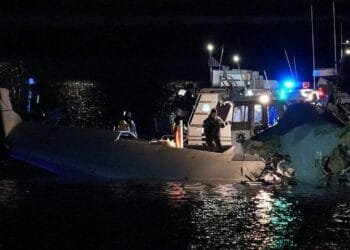 Plane carrying more than 60 collides with helicopter, crashes in Washington