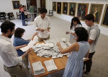 Portuguese PM’s party set to win general election, fall short of majority