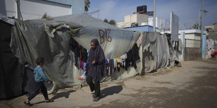 Qatar says ceasefire between Israel and Hamas will go into effect at 8:30 a.m. on Sunday