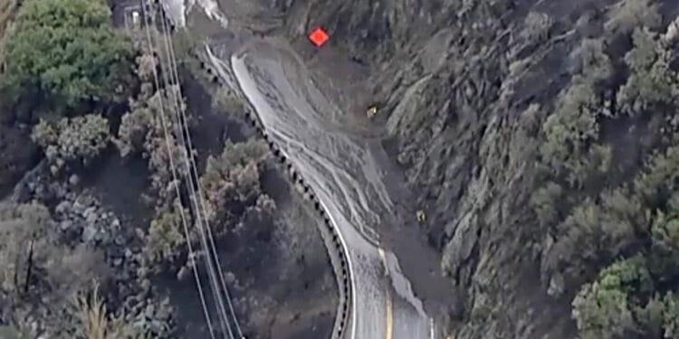 Rain helps Southern California firefighters but sends ash and mud flowing down hillsides 1 Rain helps Southern California firefighters but sends ash and mud flowing down hillsides