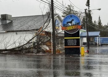 Rain turns to ice, cuts power in Great Lakes region while Tennessee braces for wild weather