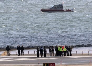 Recovery crews return to the Potomac debris after the deadly