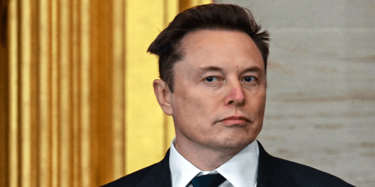 Reddit community banned as user spat with Musk intensifies 1 Elon Musk wearing a sharp black suit and tie