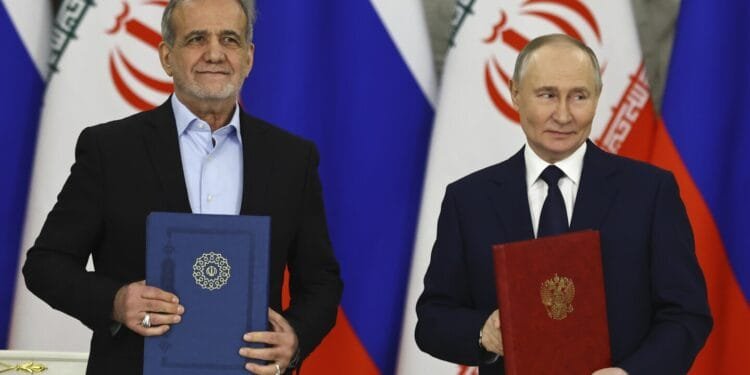Russia and Iran sign a partnership treaty to deepen their ties in the face of Western sanctions