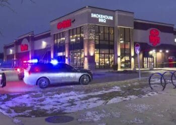 Shooting at Indiana store leaves 3 dead, including the suspect, and 2 officers wounded