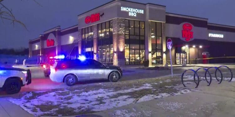 Shooting at Indiana store leaves 3 dead, including the suspect, and 2 officers wounded