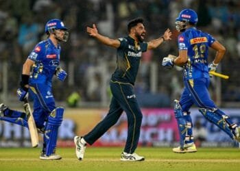 Siraj, Krishna star as Gujarat open account with win over MI